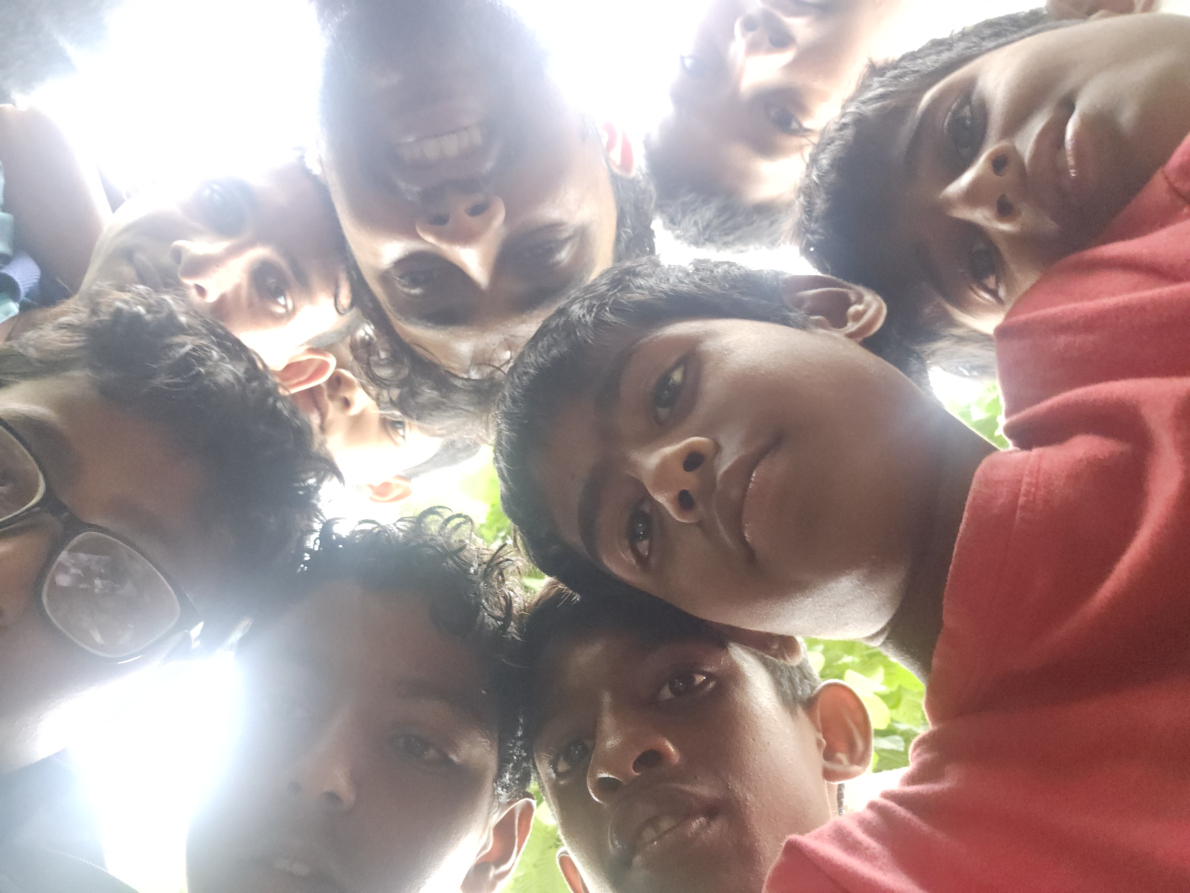Group selfie from below